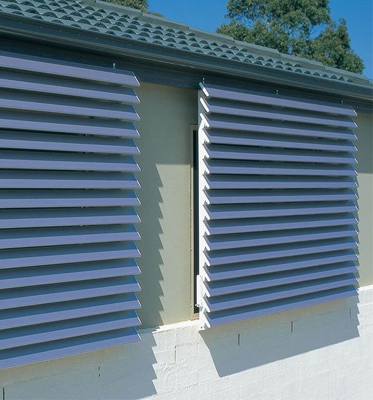 Adjustable Louvres Installed Outside the Bedroom Window — Budget Screens & Awnings in Lismore, NSW