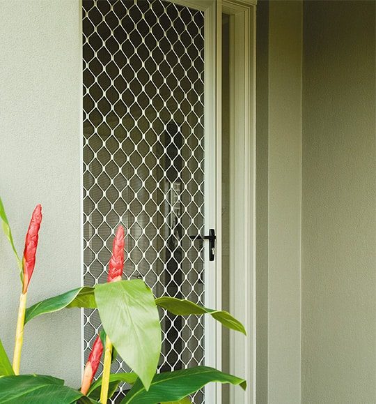 Diamond Pattern Door — Budget Screens & Awnings in Lismore, NSW
