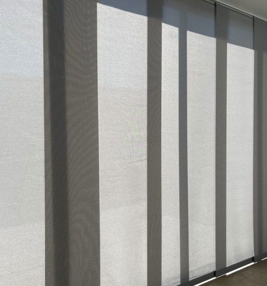 Tall blinds covering the windows — Door & Window Furnishings in the Northern Rivers